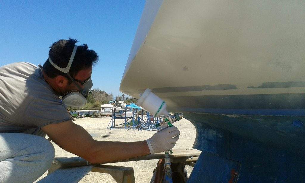 spray painter painting with a gun